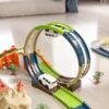 Rennstrecke Kinder – 202-teiliges Autorennbahn Set mit Loop & leuchtenden Autos